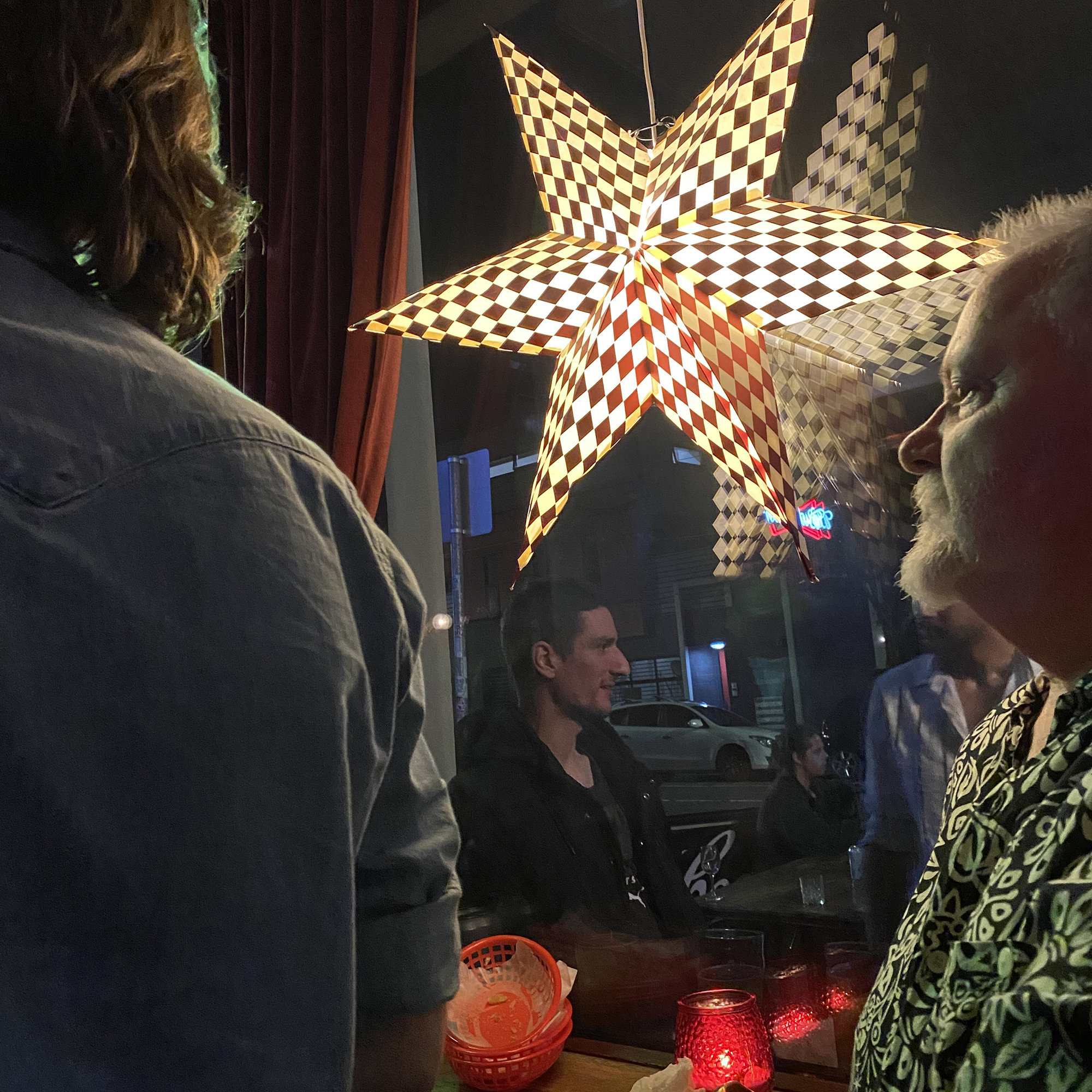 view out the gem window with nice man who let me take his photo. - he sells and makes guitars