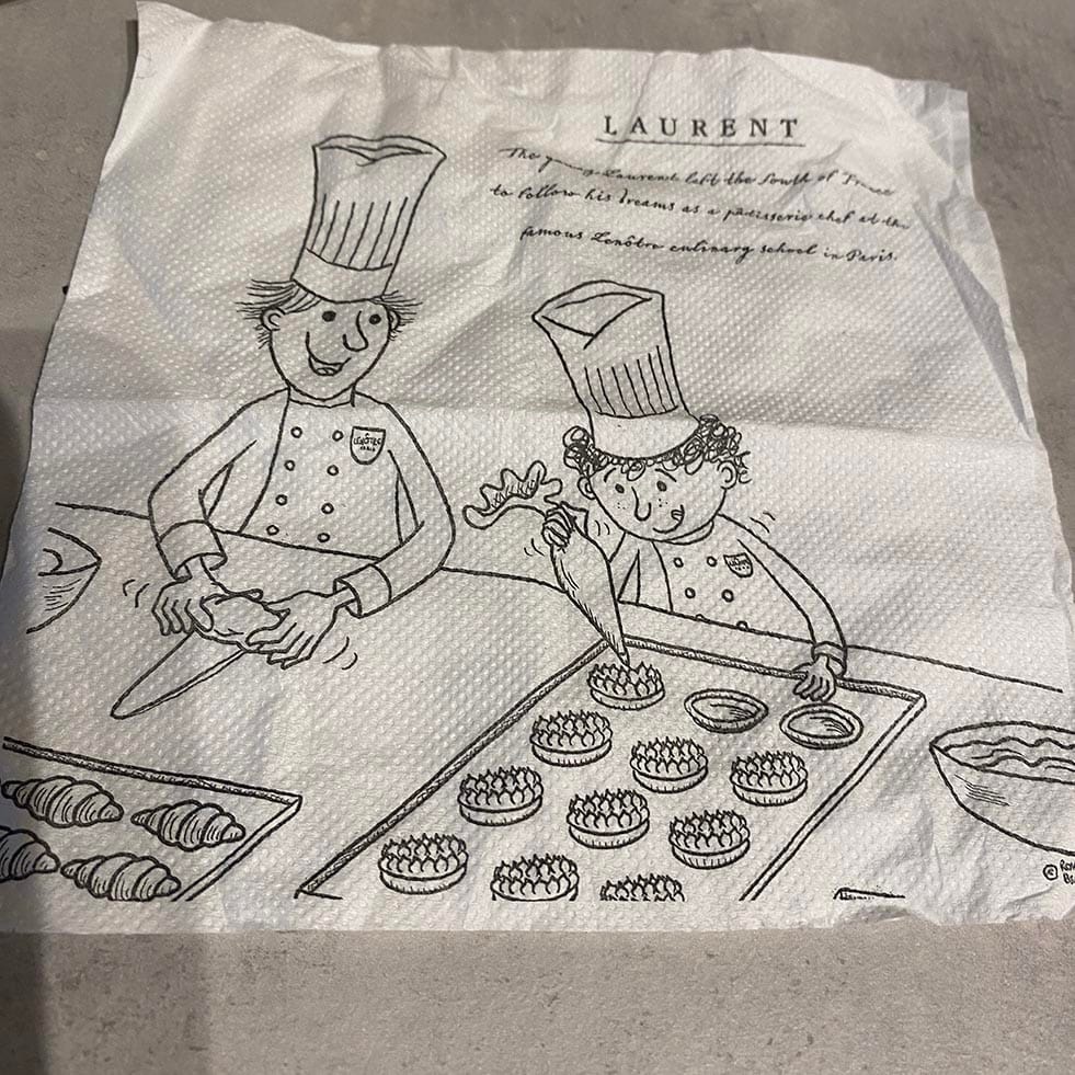 graphic image of two bakers making patisseries on a bench top and text about the story of the founding of Laurent